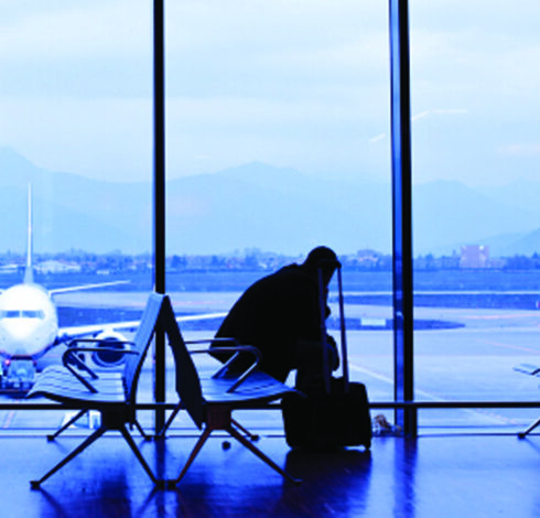 airport man waiting in lobby