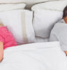 couple in bed not talking
