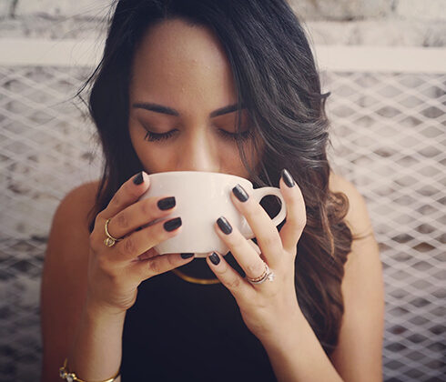 woman drinking coffee