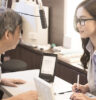 old man with optometrist in the store