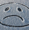sad face in the snow