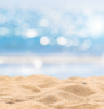 sandy beach sparkling blue sea
